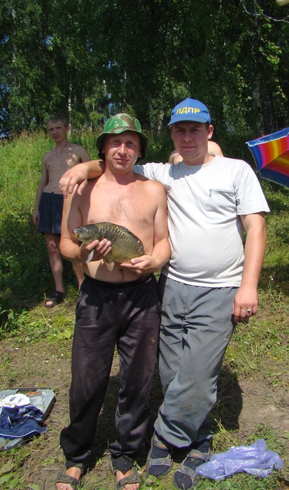 Первый пойманный карп на Рыболовном турнире "Сибирское лето-2008"