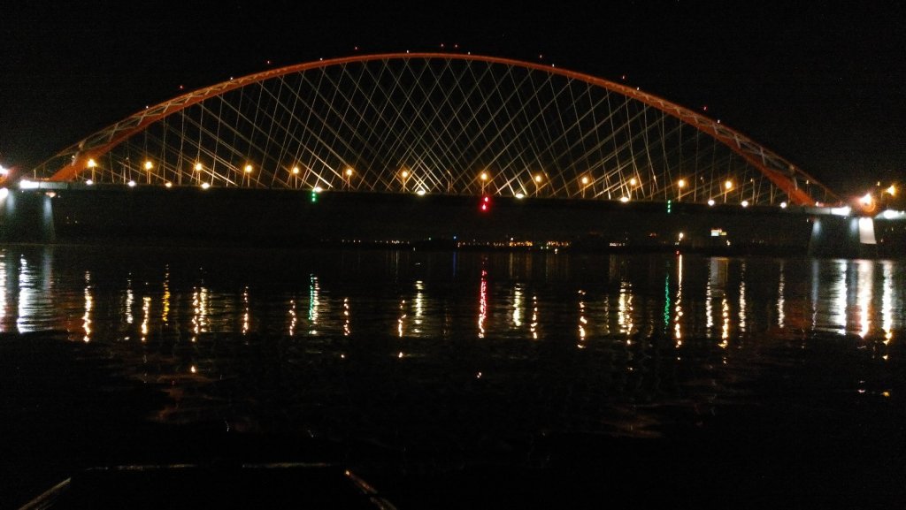 Бугринский мост с воды ночью.