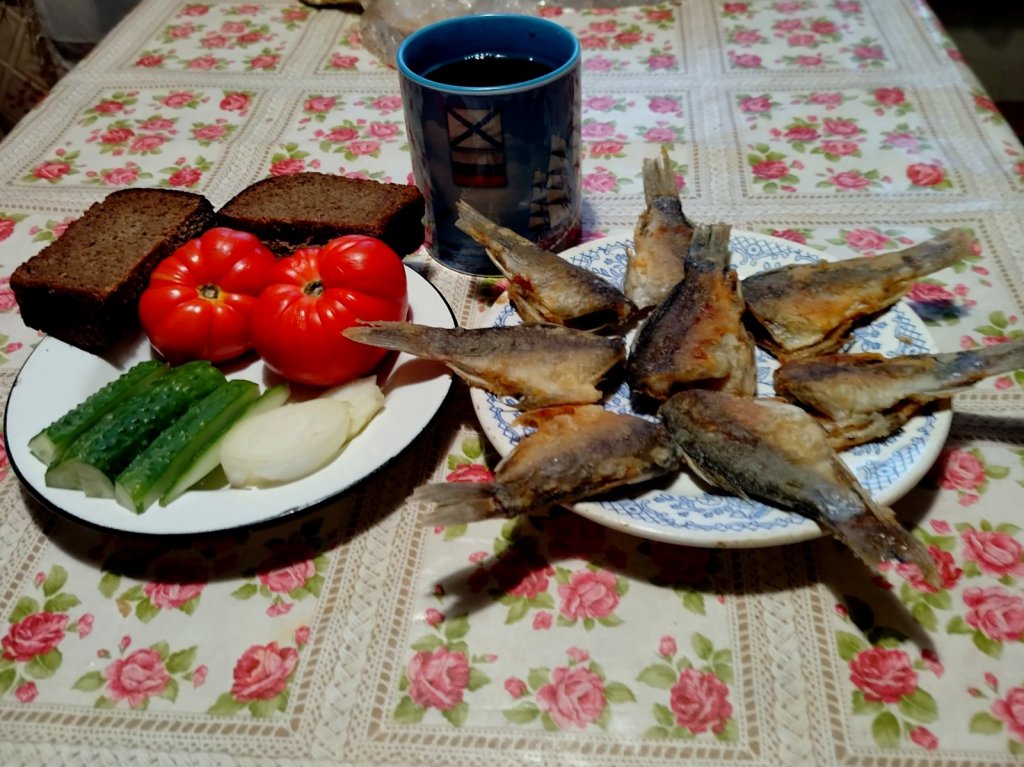 Вечерняя трапеза рыбачка.