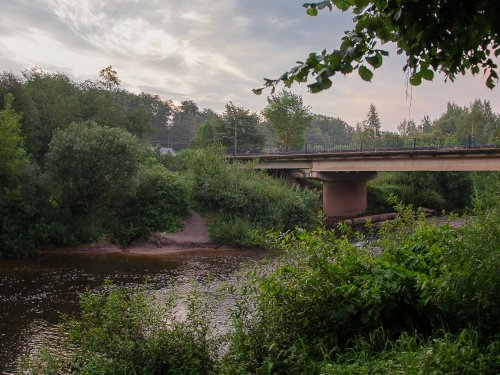 На реке.